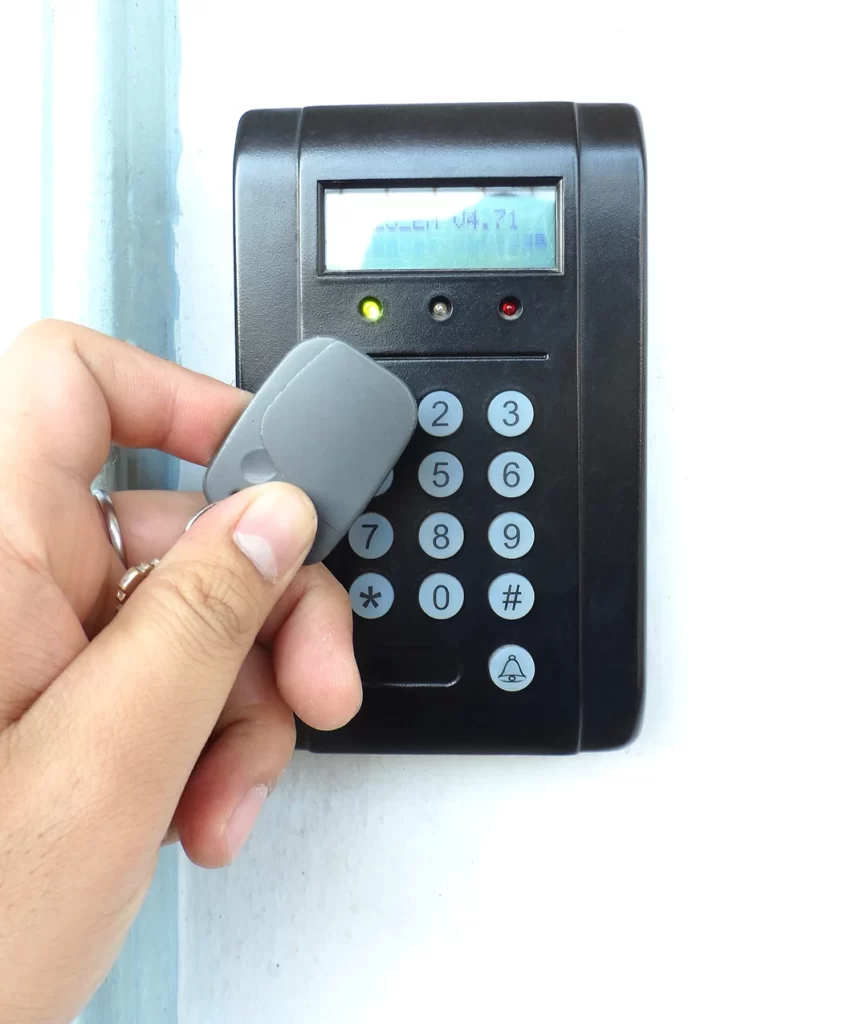 Door access control with a hand inserting key card to lock and u